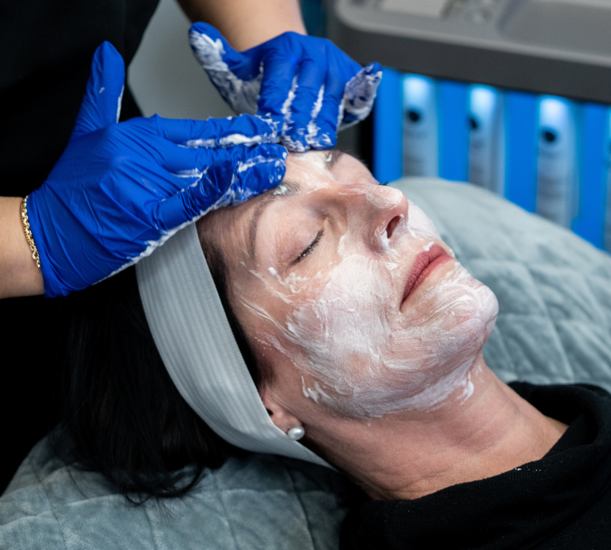 Woman receiving facial